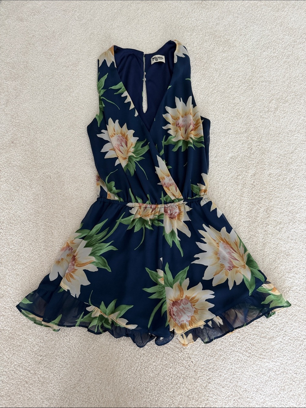 Show Me Your MuMu Navy Floral Romper with White and Green Blooms